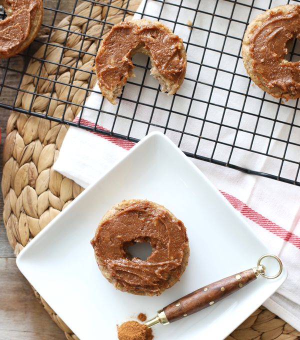 These Apple Spice Donuts are baked in a donut pan and so easy to make! They are paleo and have a clean and tasty frosting!