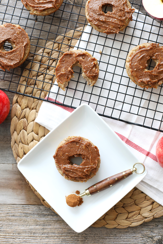 These Paleo Apple Spice Donuts are baked in a donut pan and so easy to make! They are paleo and have a clean and tasty frosting!