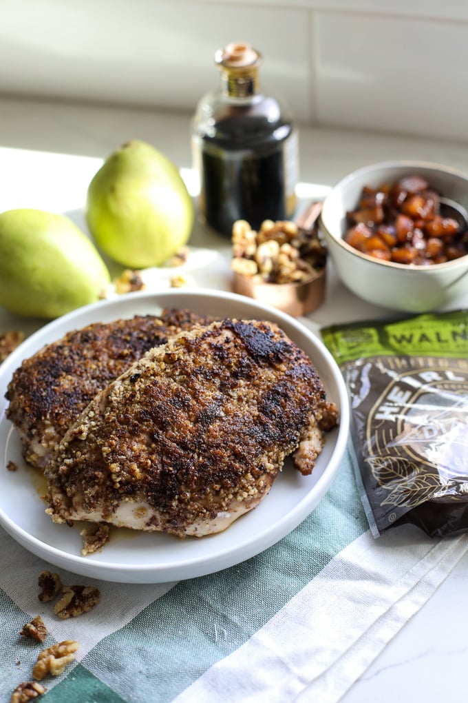 This Walnut Crusted Chicken w/ Balsamic Pear Compote is a super simple yet extremely tasty whole30 dinner that the whole family will love!