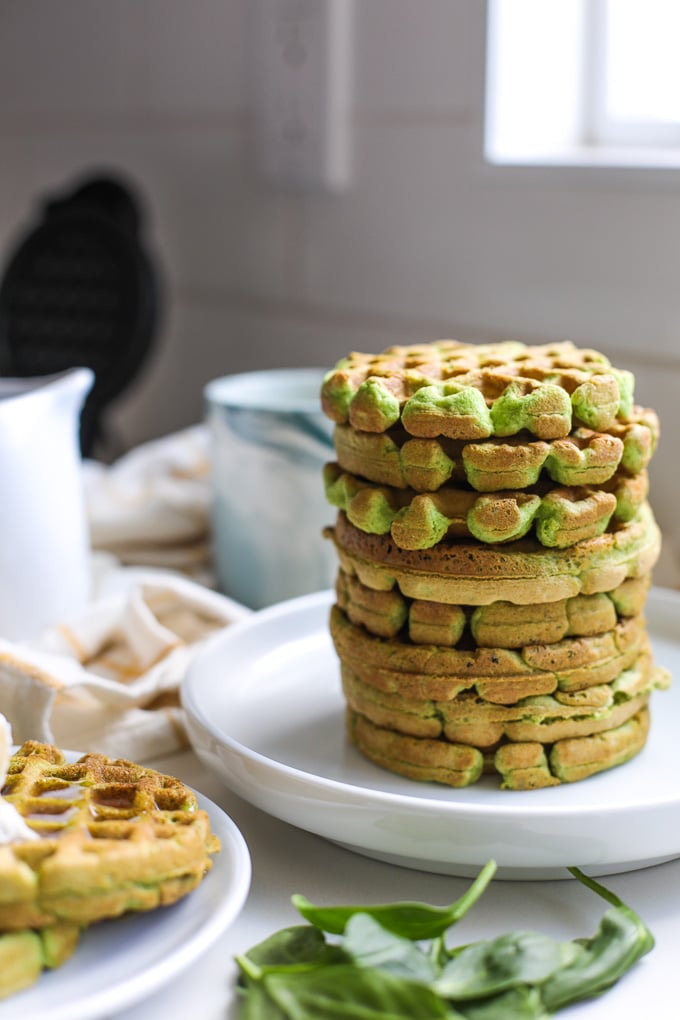 These Spinach Almond Flour Waffles are a simple paleo breakfast that the whole family will love! Perfect for sneaking in extra veggies in a delicious way!
