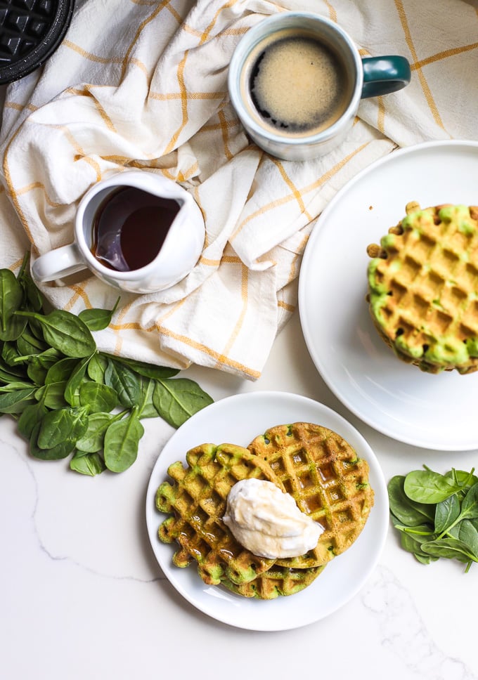 These Spinach Almond Flour Waffles are a simple paleo breakfast that the whole family will love! Perfect for sneaking in extra veggies in a delicious way!