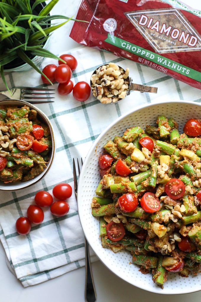 This Asparagus Salad with Sun Dried Tomato Pesto is a great spring time side dish! Paleo, super clean and packed with nutrients!