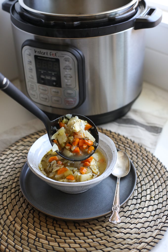 This Instant Pot Artichoke Chicken soup is super easy to make and full of tons of flavor!