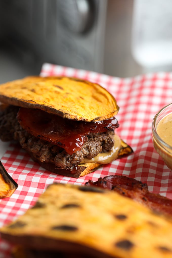 This Peanut Butter Jelly and Bacon Burger on Sweet Potato Toast is the perfect combination of salty and sweet! 