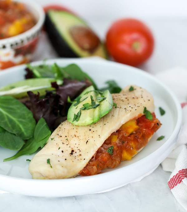 This Roasted Mango Salsa Stuffed Chicken is a fabulous meal for a quick and fresh dinner that is whole30 compliant!