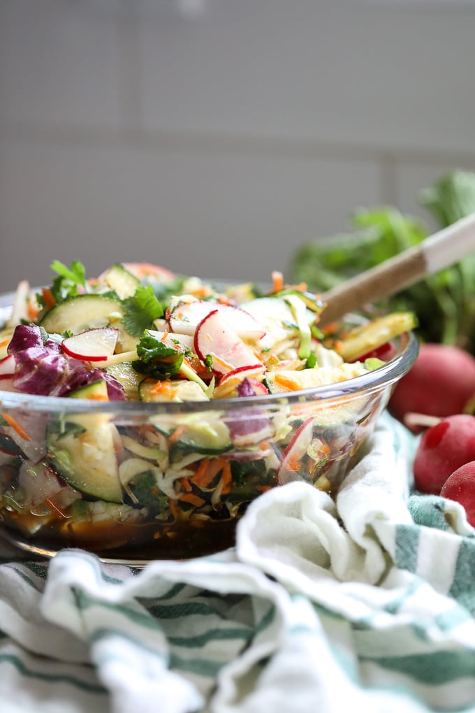 This Fresh Asian Radish Salad is packed with fresh veggies and has an amazing asian dressing that is easy to throw together!