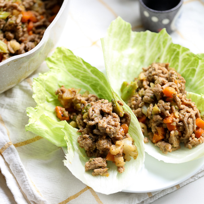 These Turkey and Sweet Potato Asian Lettuce Wraps are a super easy dinner for a weeknight using frozen vegetables for added nutrients! Whole30 and paleo dinner!