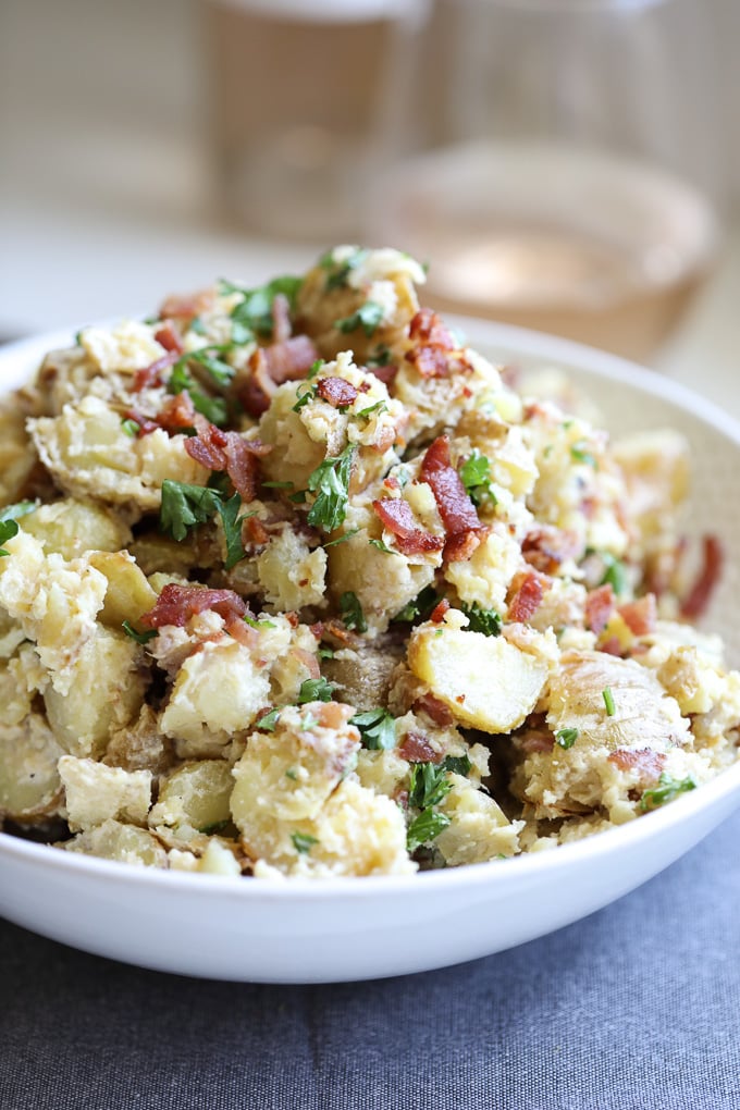 This Creamy Caesar Bacon Potato Salad is the perfect clean and Whole30 side dish recipe for summer! All the best flavors to create a great BBQ staple!