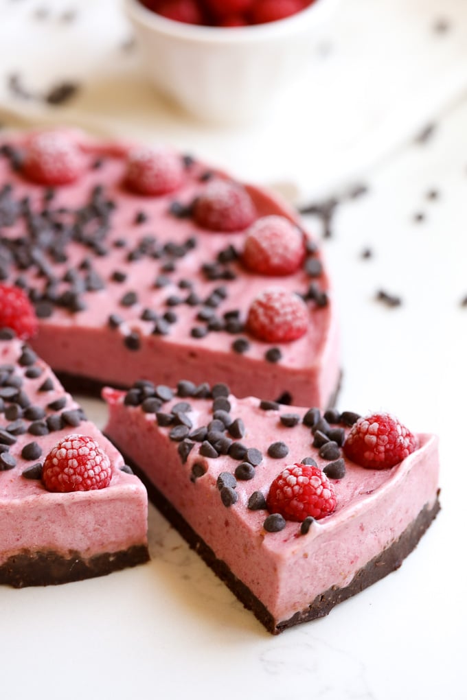 This raspberry chocolate chip nice cream tart is the perfect summer treat that is packed with flavor and made with clean ingredients!