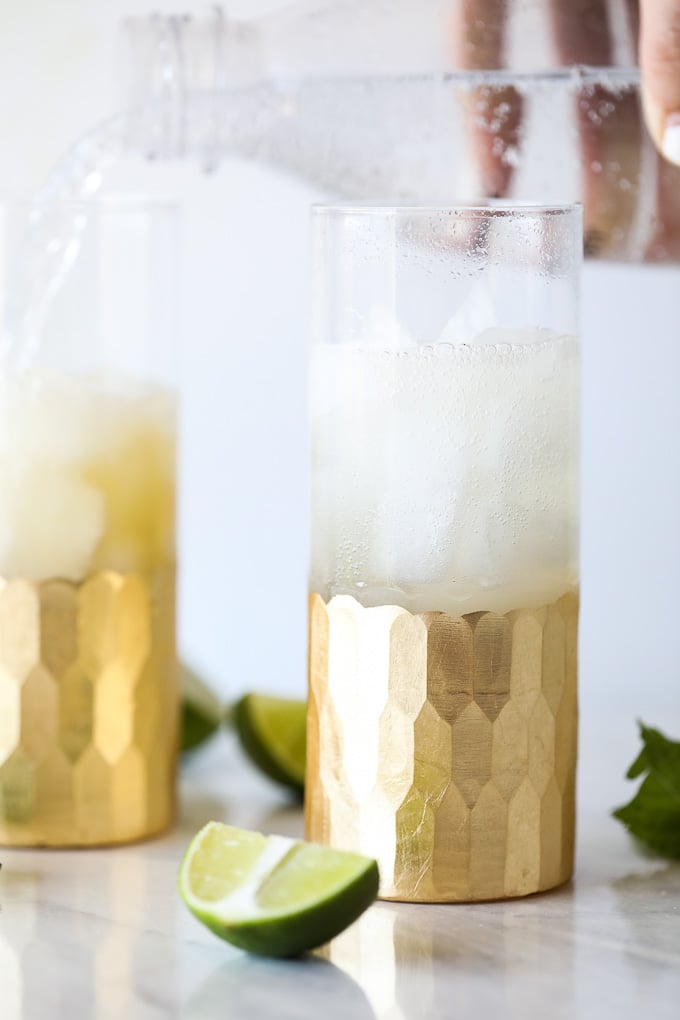 This Vodka Mojito Spritz is a fabulous cocktail that is light, healthy and made with natural sweetener!