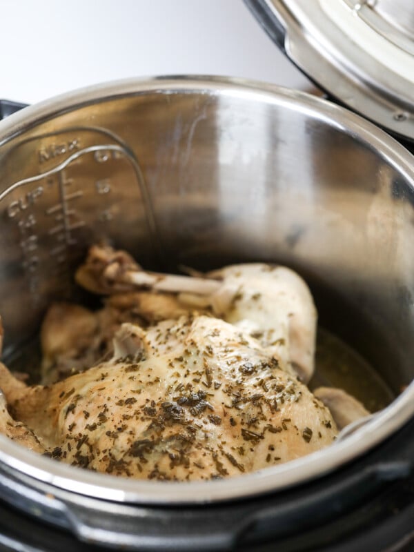 This herb stuffed instant pot whole chicken is perfect to make a bunch of chicken to prep for the week!