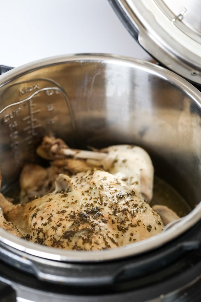 This herb stuffed instant pot whole chicken is perfect to make a bunch of chicken to prep for the week!