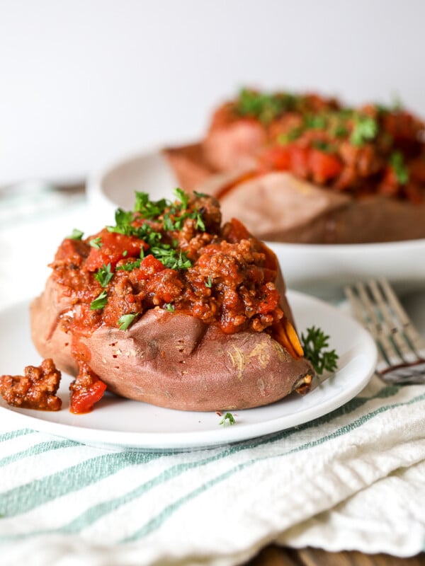 These Paleo Chili Stuffed Sweet Potoates are great for any meal of the day! Packed with protein and nutrients and also Whole30 compliant!