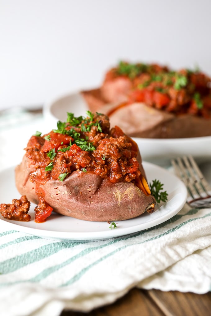 These Paleo Chili Stuffed Sweet Potoates are great for any meal of the day! Packed with protein and nutrients and also Whole30 compliant!