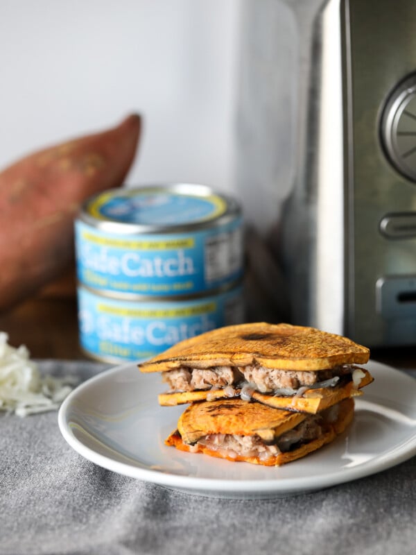 This Sweet Potato Toast Tuna Melt is so easy to make and fills that comfort food craving with no grains! Perfect with tomato soup for a quick and healthy lunch.