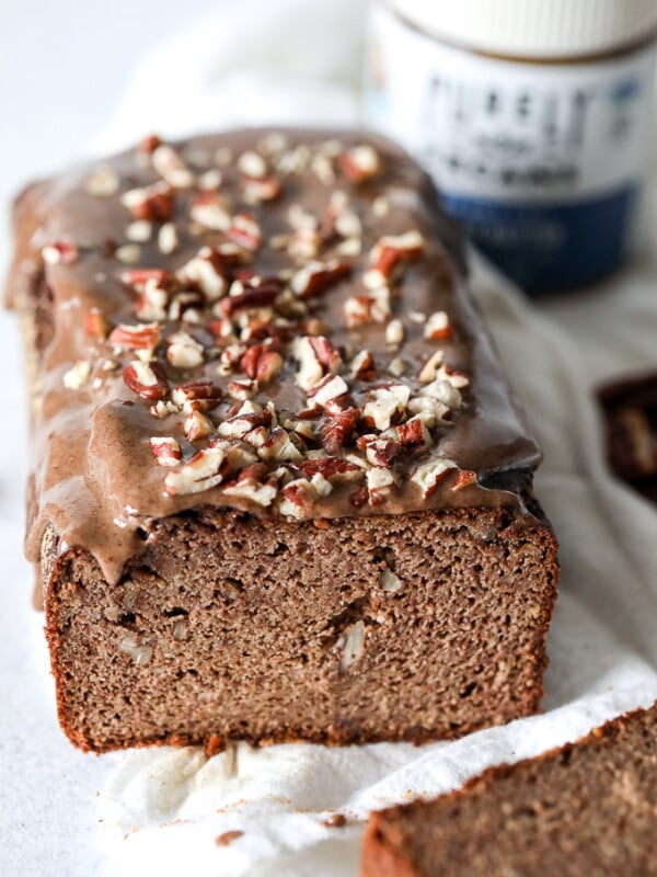 This Paleo Cinnamon Pecan Banana Bread is a simple, grain free & refined sugar free recipe that no one will even know is paleo!