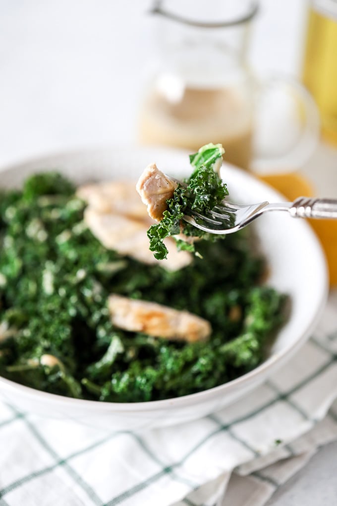 This Warm Kale Chicken Caesar Salad is a great way to enjoy a salad in the colder months! Whole30 compliant and an easy caesar dressing that is dairy free!