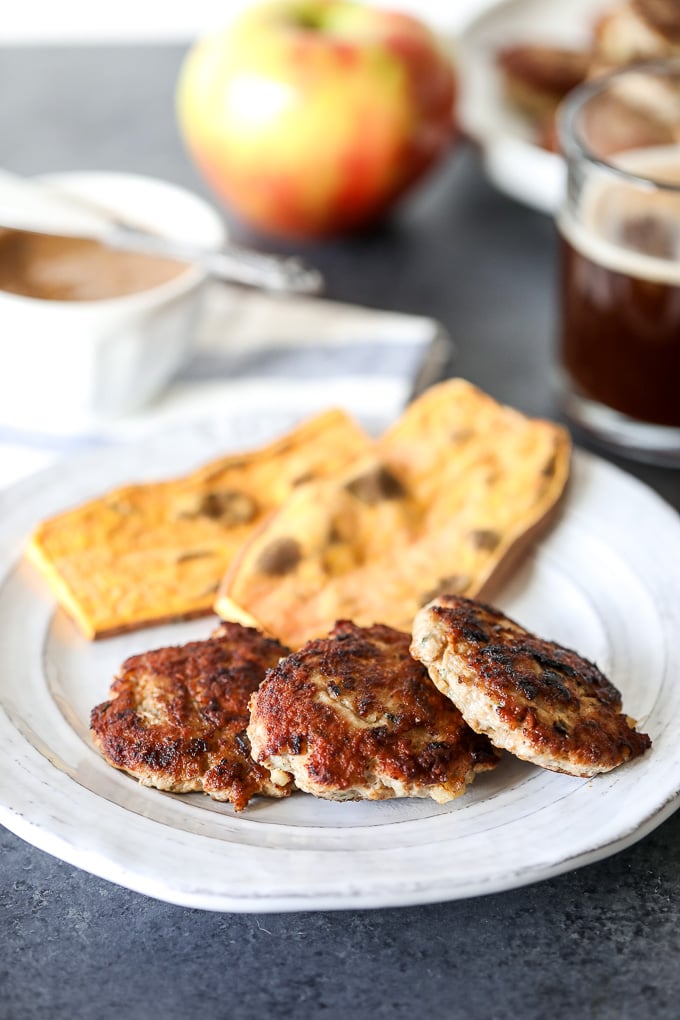 This Whole30 Garlic Herb and Apple Breakfast Sausage recipe is so delicious and easy to make for your Whole30! Prep ahead and freeze them as well!