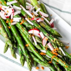 This Orange Ginger Asparagus & Radish Salad is full of spring veggies and delicious flavors. It is also whole30 and super simple!!