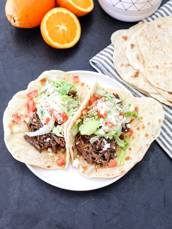 These Citrus Garlic Shredded Tacos are so easy to make and a staple for a weeknight taco recipe!