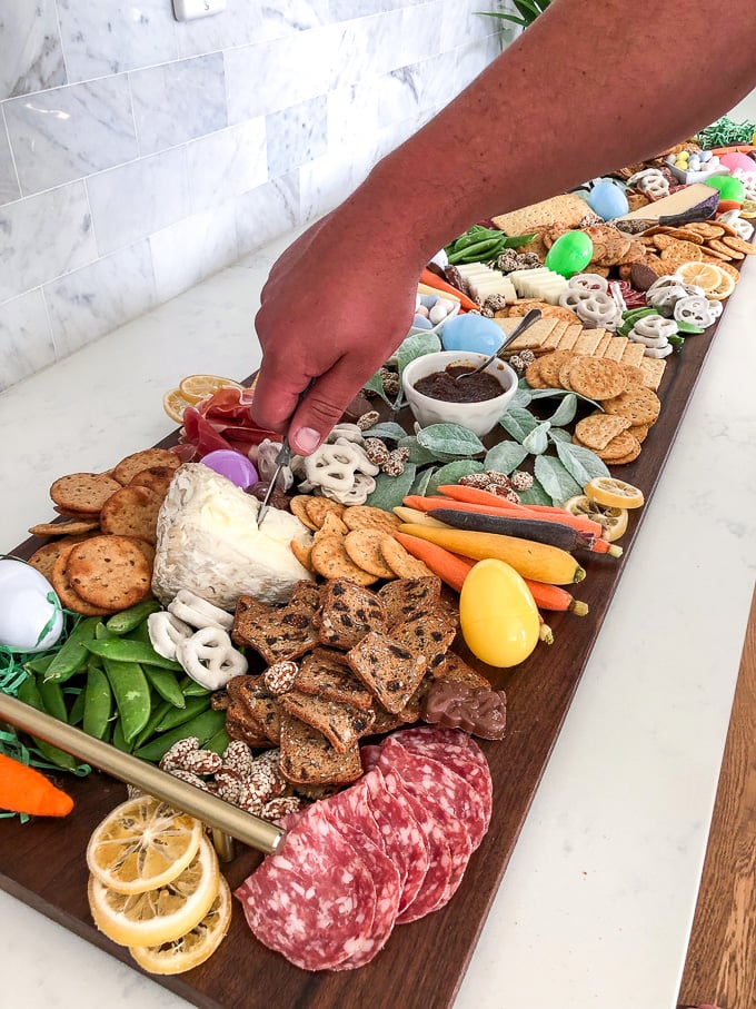 This simple guide will teach you how to put together the ultimate cheese board for your easter gathering!