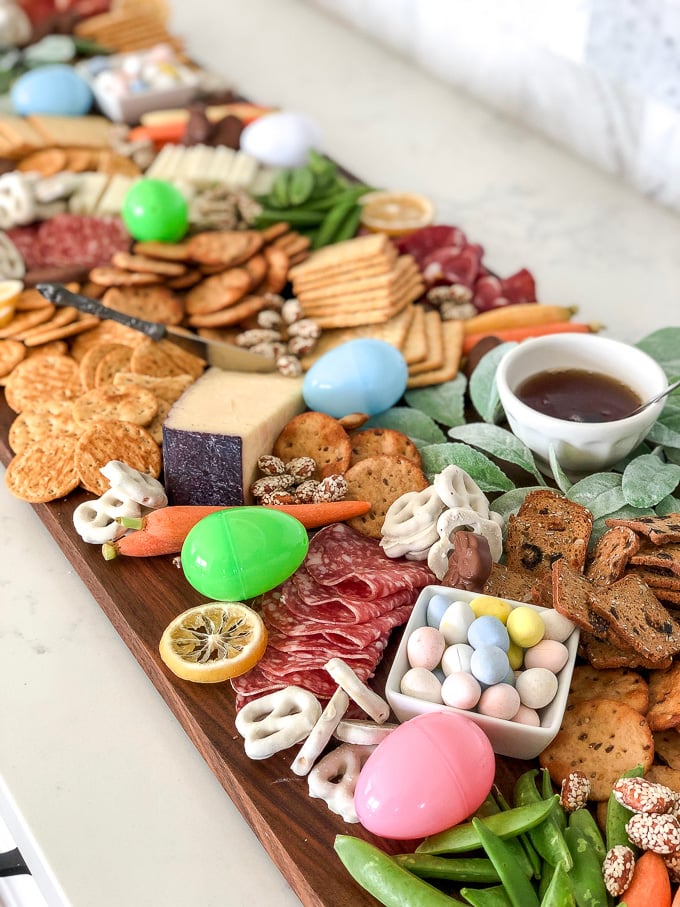 This simple guide will teach you how to put together the ultimate cheese board for your easter gathering!