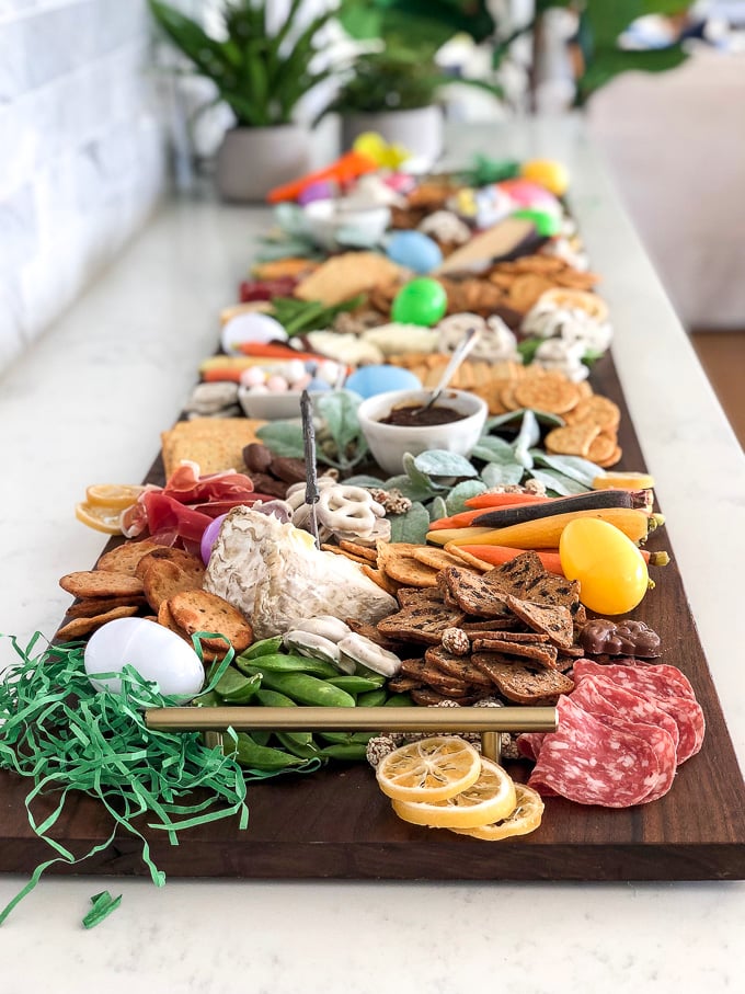 This simple guide will teach you how to put together the ultimate cheese board for your easter gathering!