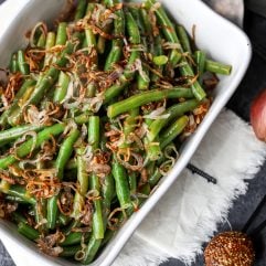 These Green Beans with Sweet Dijon Sauce and Crispy Shallots are a super easy whole30 side dish that everyone will love!