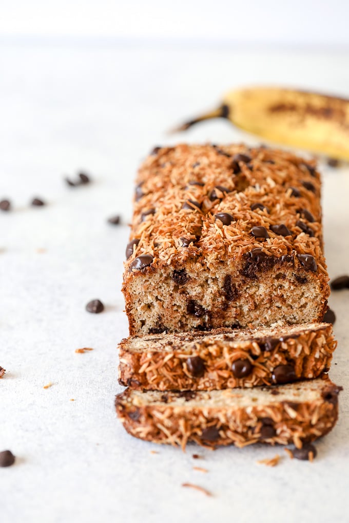 This Paleo Toasted Coconut Chocolate Chip Banana Bread is the perfect treat that is free from dairy, grains and refined sugar!