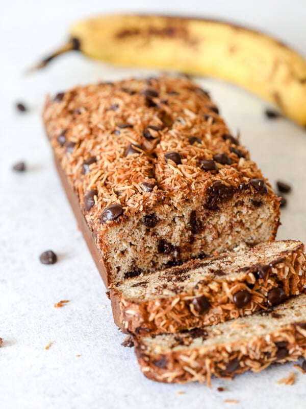 This Paleo Toasted Coconut Chocolate Chip Banana Bread is the perfect treat that is free from dairy, grains and refined sugar!