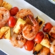 These Pineapple BBQ Shrimp Skewers are Whole30 compliant, super easy to make and great to toss on the grill this summer!