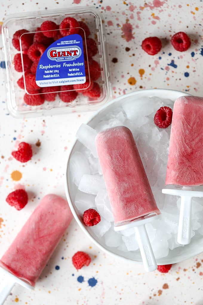 These Raspberries and Cream Popsicles are paleo, super simple to make and only have 4 ingredients!