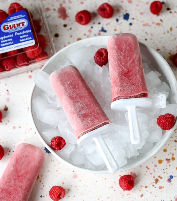 These Raspberries and Cream Popsicles are paleo, super simple to make and only have 4 ingredients!