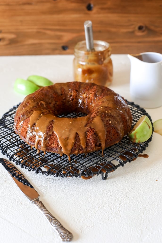 This apple cake with salted caramel glaze is grain free, dairy free and perfect for a healthy fall treat!