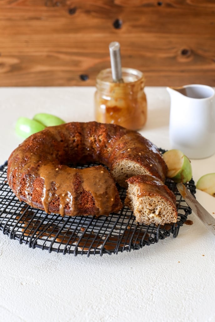 This apple cake with salted caramel glaze is grain free, dairy free and perfect for a healthy fall treat!