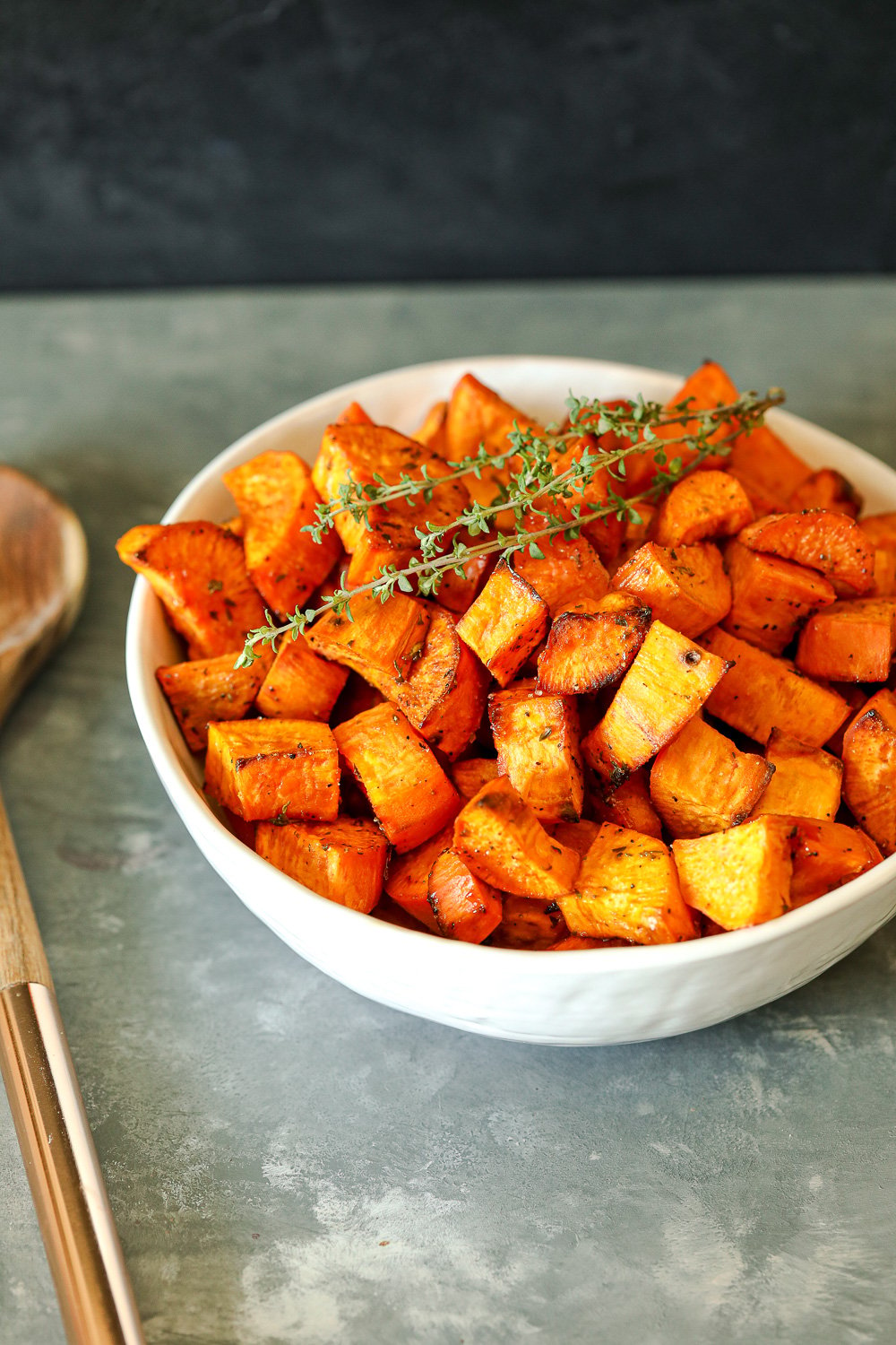 These Maple Thyme Roasted Sweet Potatoes are so simple to make yet so delicious!
