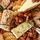 This Thanksgiving Charcuterie Board has Maple Sage Pecans, a Rosemary Pecan Crusted Goat Cheese and a Honey Cinnamon Pecan spread that will wow any crowd this holiday!