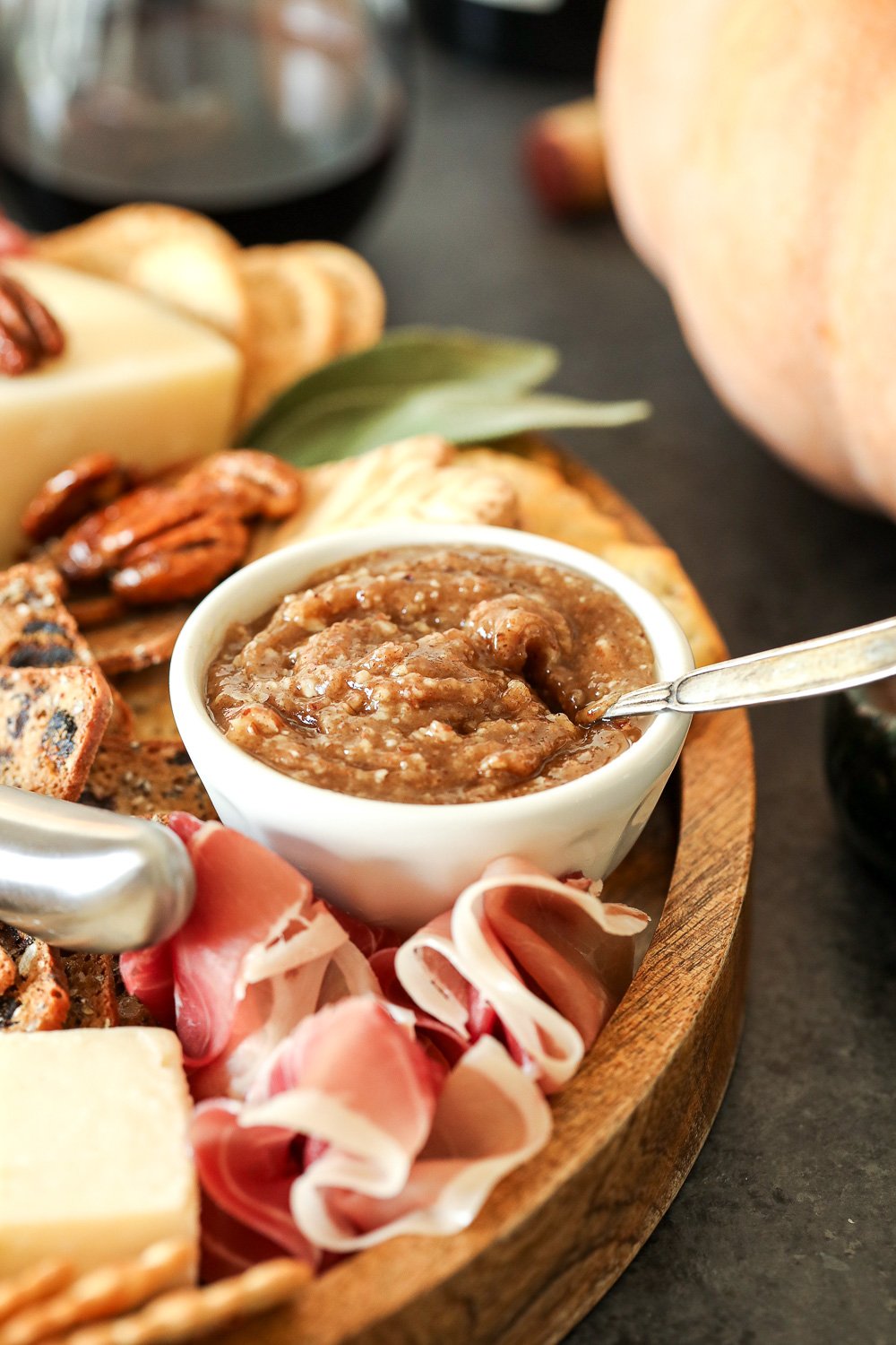 This Pecan-Packed Holiday Charcuterie Board has Maple Sage Pecans, a Rosemary Pecan Crusted Goat Cheese and a Honey Cinnamon Pecan spread that will wow any crowd this holiday!