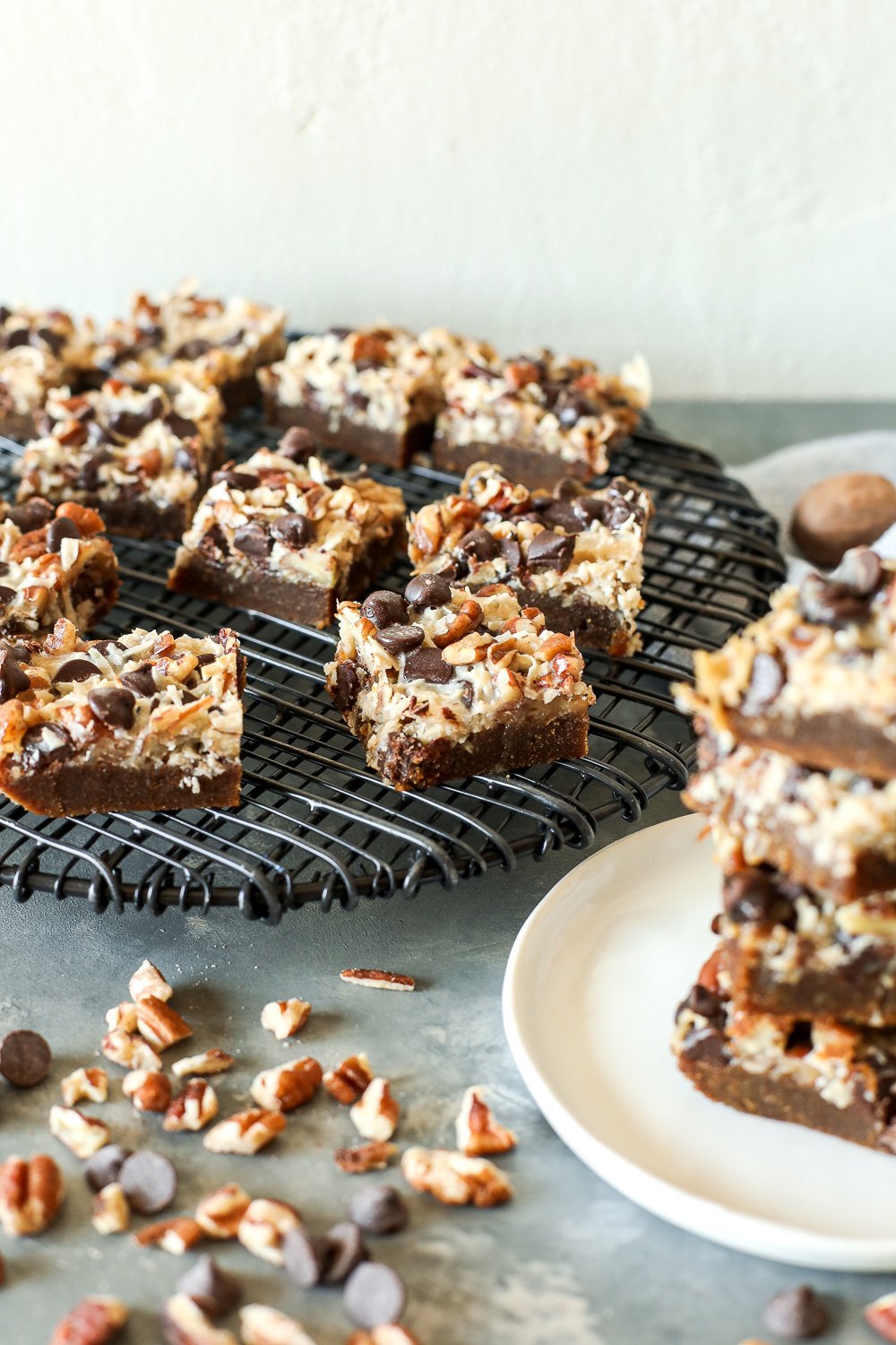 This Paleo Gingerbread Pecan Magic Bars recipe is so delicious and you would never believe it is dairy free!