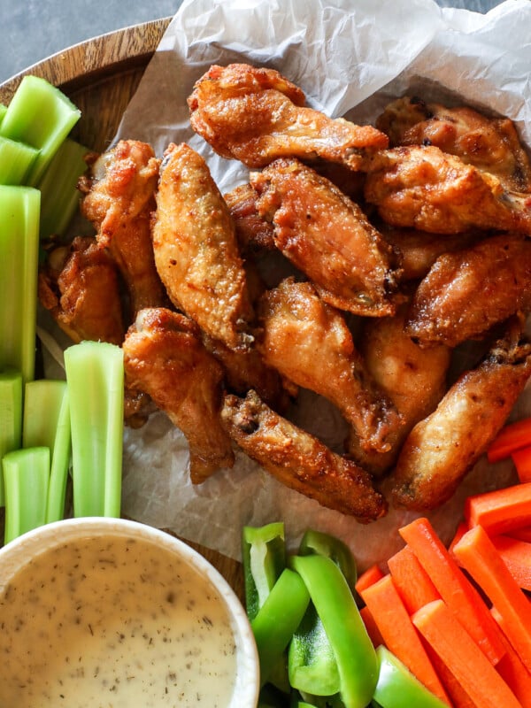 These Crispy Baked Lemon Garlic Chicken Wings are perfect for the super bowl or even just a weeknight!