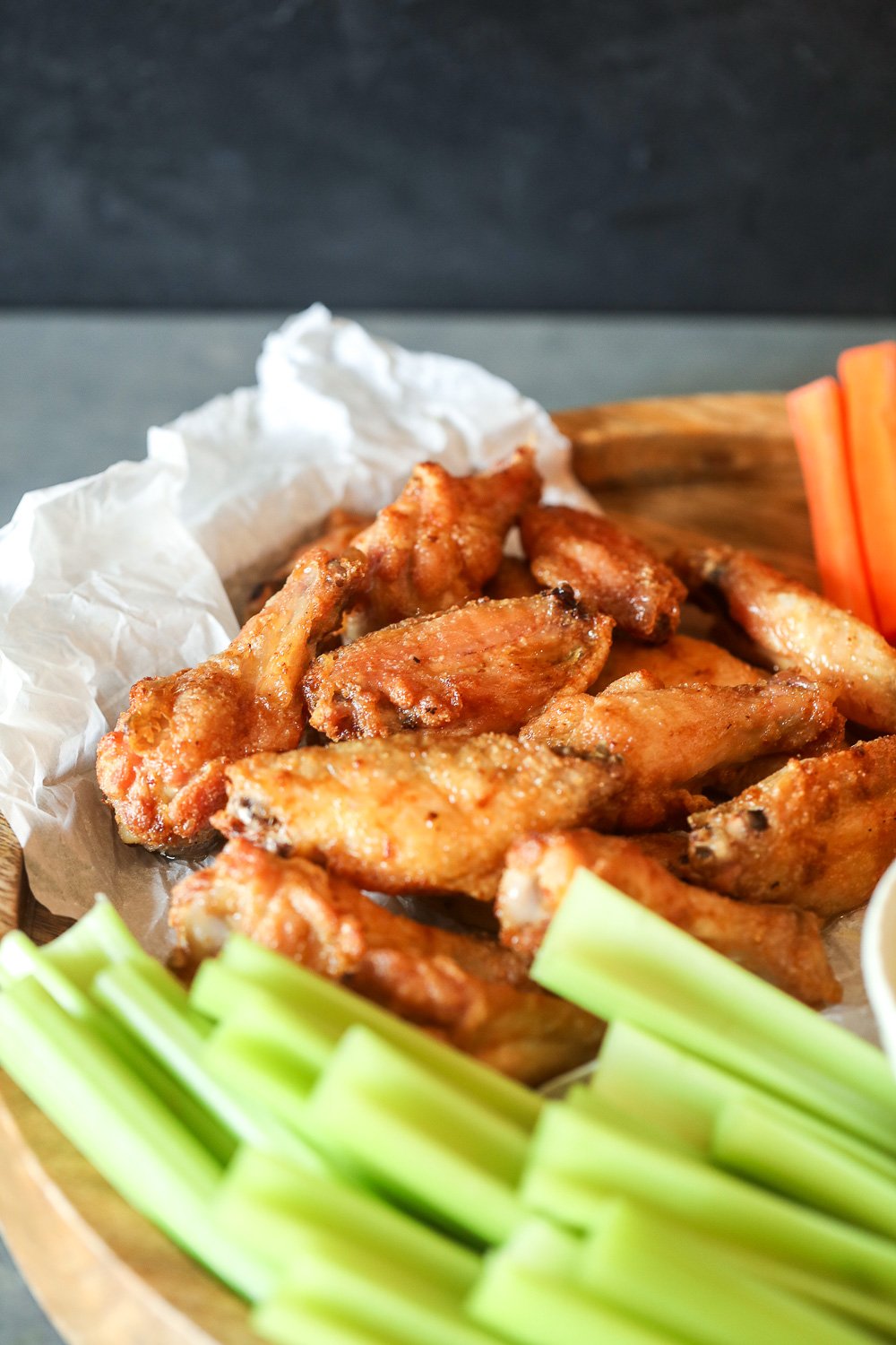 These Crispy Baked Lemon Garlic Chicken Wings are perfect for the super bowl or even just a weeknight!