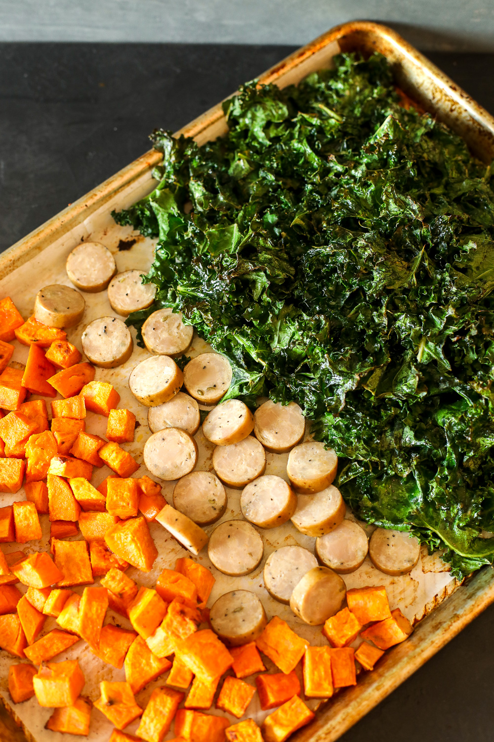 This Sheet Pan Kale & Chicken Sausage Salad is a simple and whole30 way to get dinner on the table quickly!