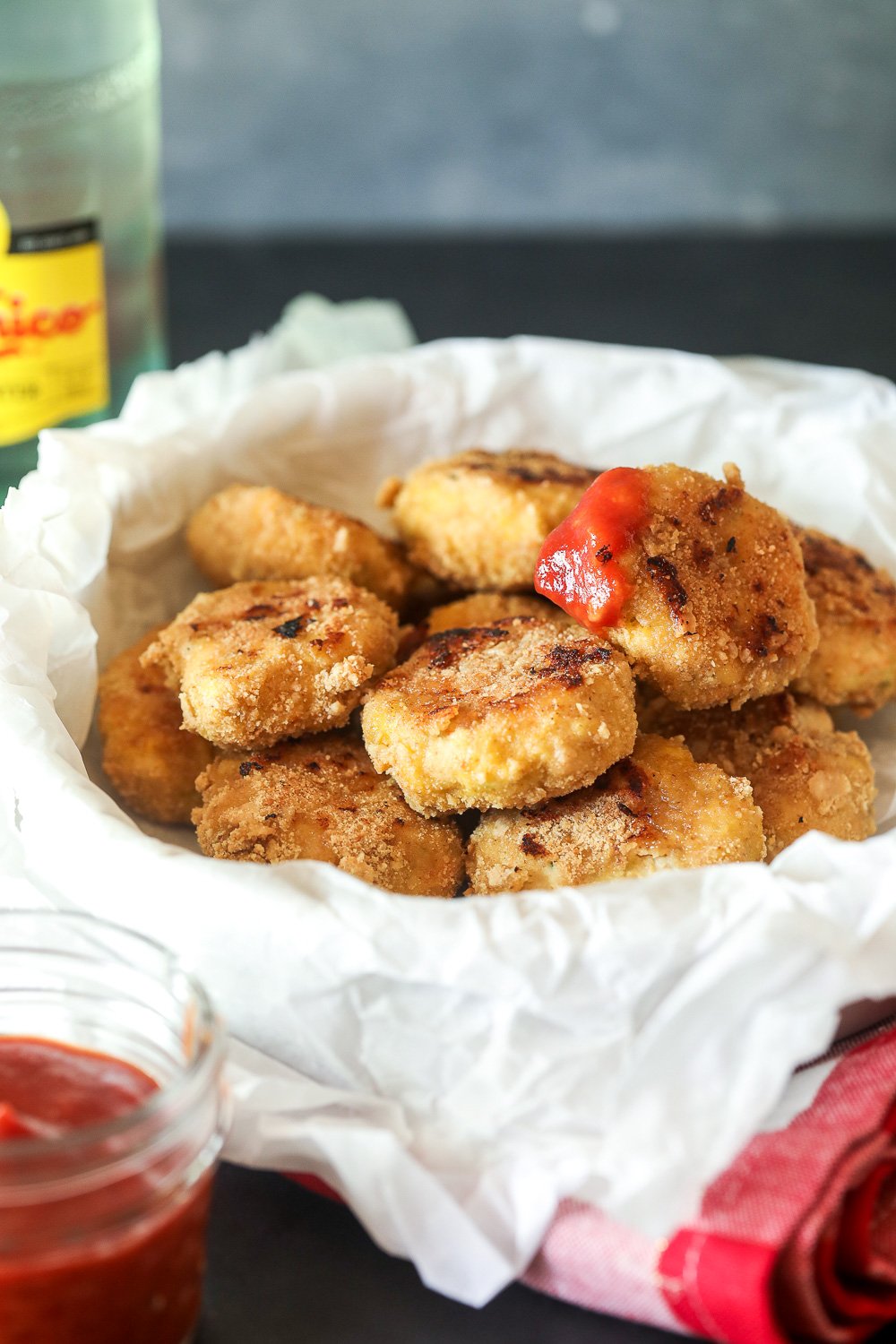 These Veggie Packed Chicken Nuggets are a great way to get sweet potato and broccoli into your kids favorite meal and are also paleo!