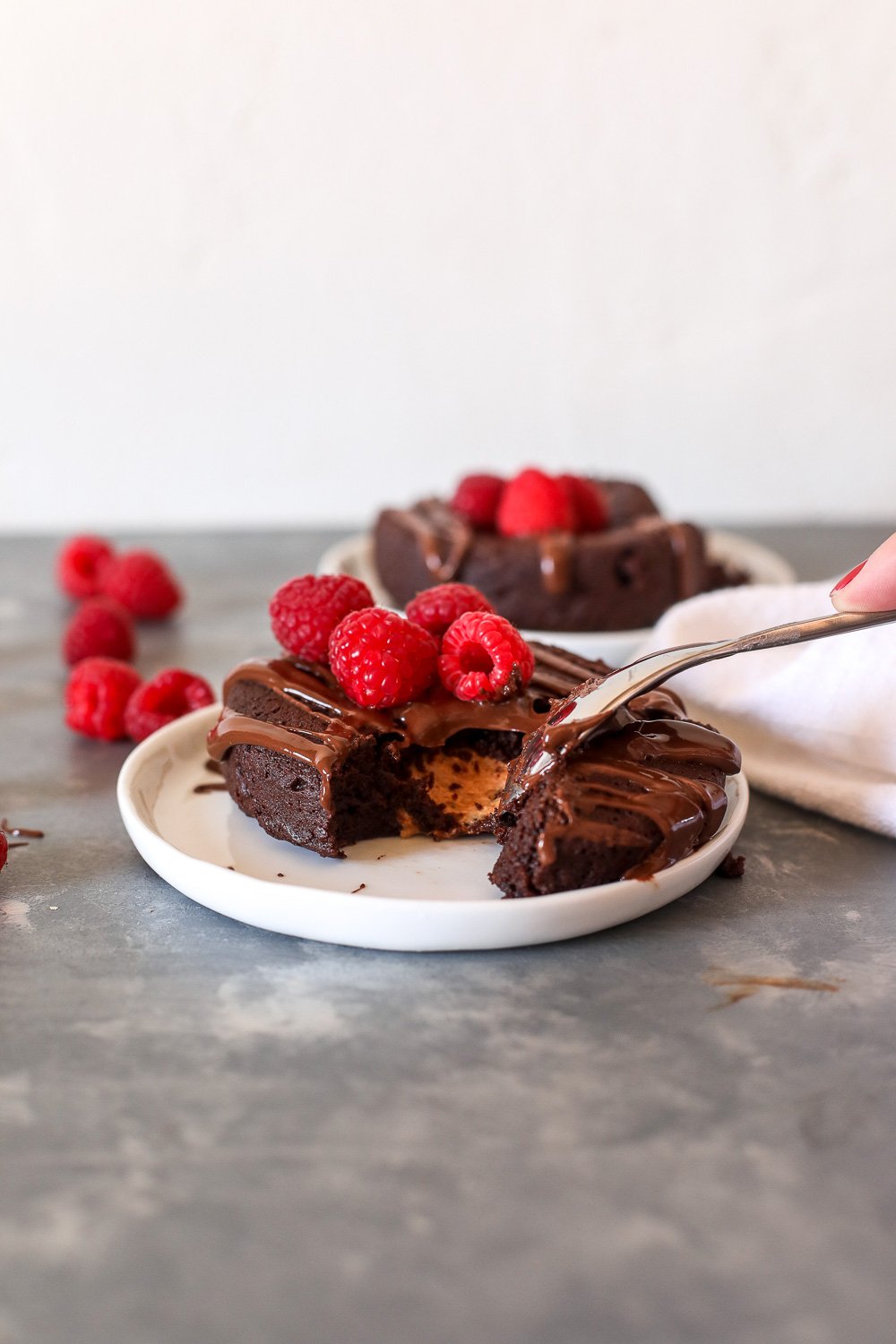 This Nut Butter Stuffed Chocolate Cake is grain free, dairy free and so decadent and delicious for valentine's day!