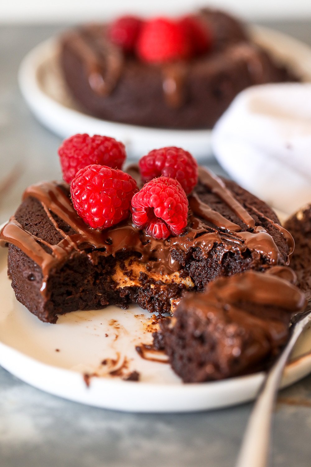 This Nut Butter Stuffed Chocolate Cake is grain free, dairy free and so decadent and delicious for valentine's day!