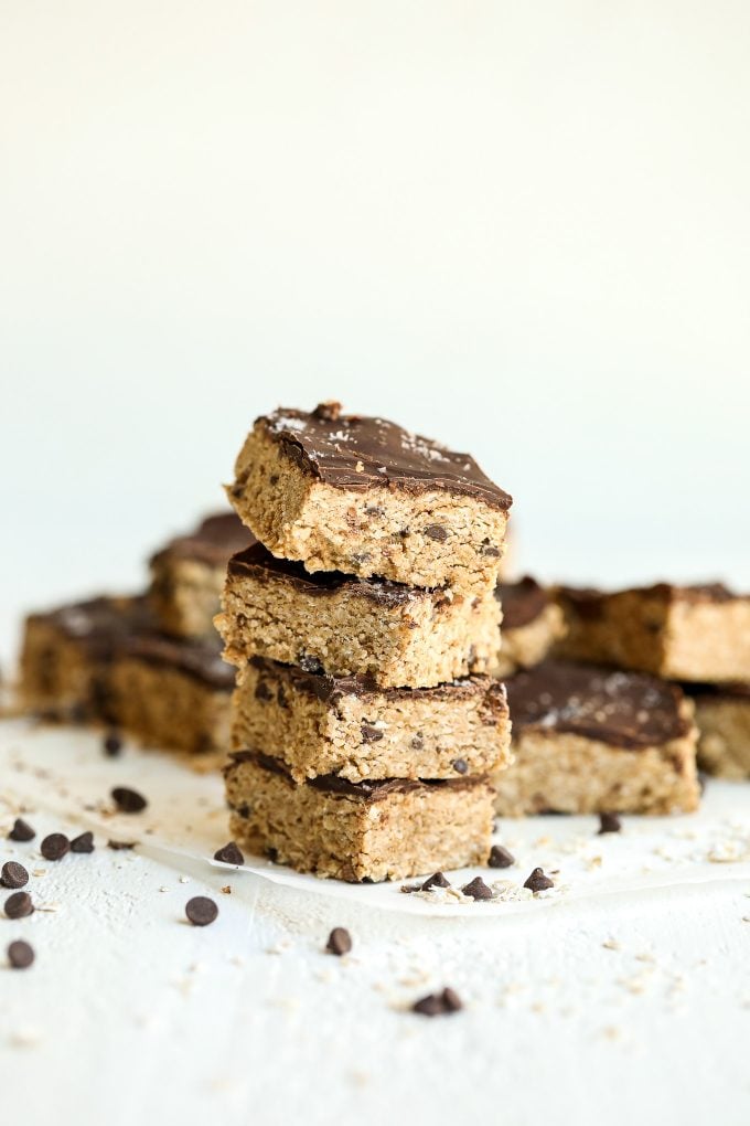 These Oatmeal Chocolate Chip Cookie Dough Bars are gluten free, dairy free, refined sugar free and no bake! They are so simple and so tasty.