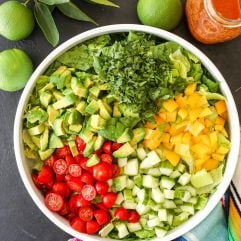 This Fiesta Salad with Salsa Vinaigrette is the perfect side salad with tacos and super easy to make!