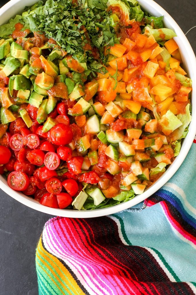 This Fiesta Salad with Salsa Vinaigrette is the perfect side salad with tacos and super easy to make!