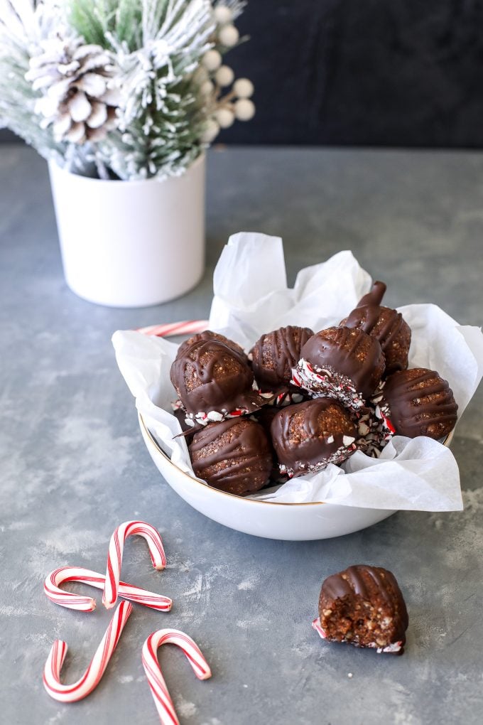 These Chocolate Peppermint Energy Truffles are the perfect mix of healthy ingredients packed with nutrients but also dipped in chocolate for a truffle taste!