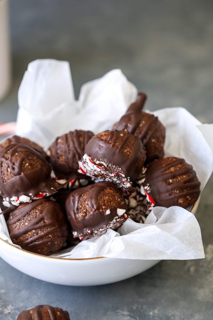 These Chocolate Peppermint Energy Truffles are the perfect mix of healthy ingredients packed with nutrients but also dipped in chocolate for a truffle taste!